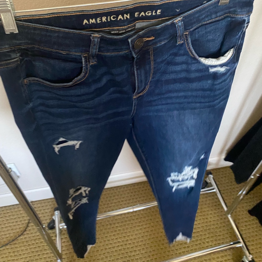 Dark wash never worn jeans with rips